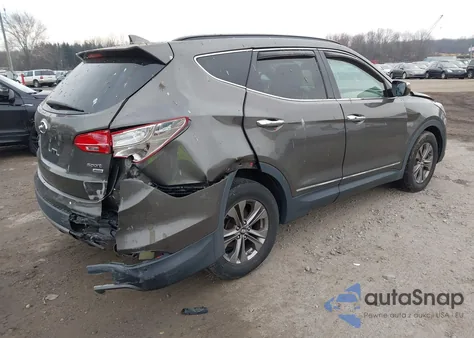 2014 Hyundai Santa Fe Sport 2.4L z USA, uszkodzony, nr VIN 5XYZUDLB1EG223309